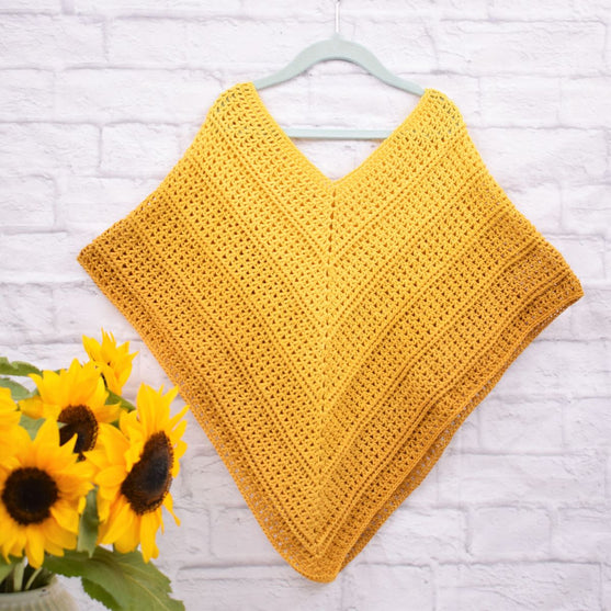 Timeless Child Poncho – Sultan
3