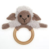 Chanel on cosy blanket and wooden ring
5