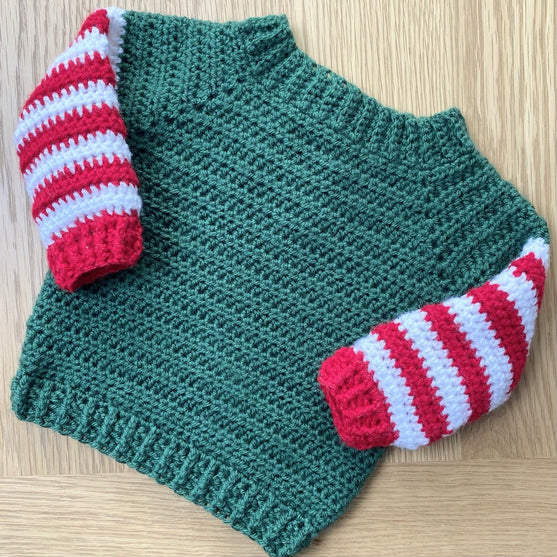 

Baby Elf - Christmas Jumper and Bonnet
5