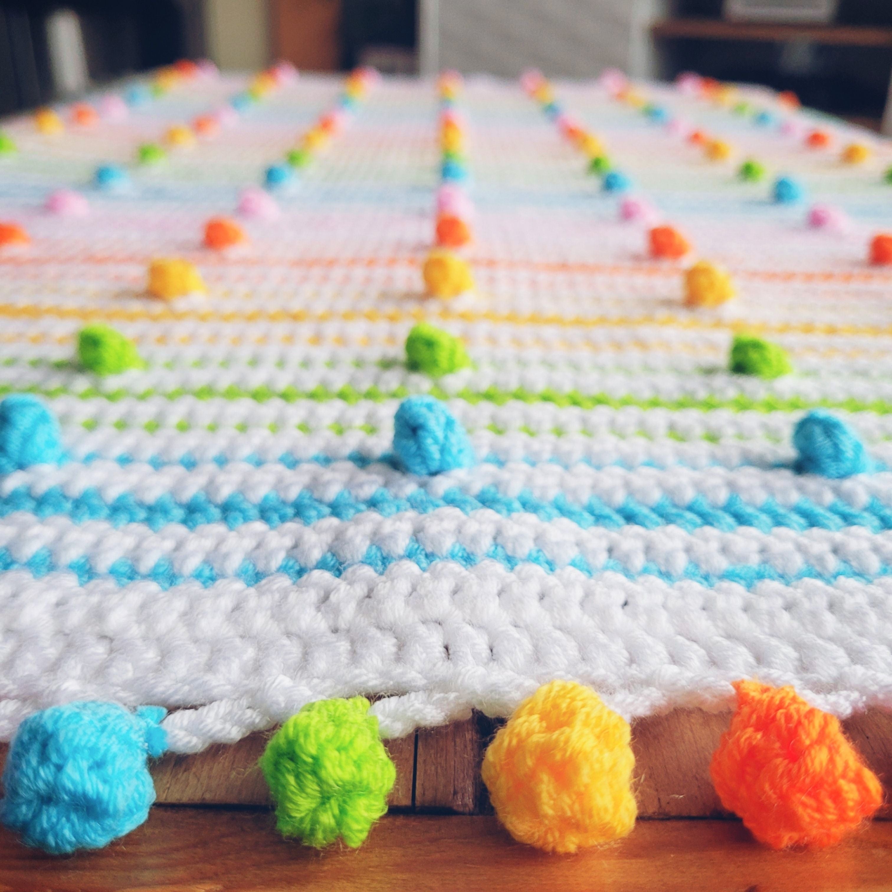Baby Blanket Crochet With Pom Pom Yarn A Spot Of Spring Baby